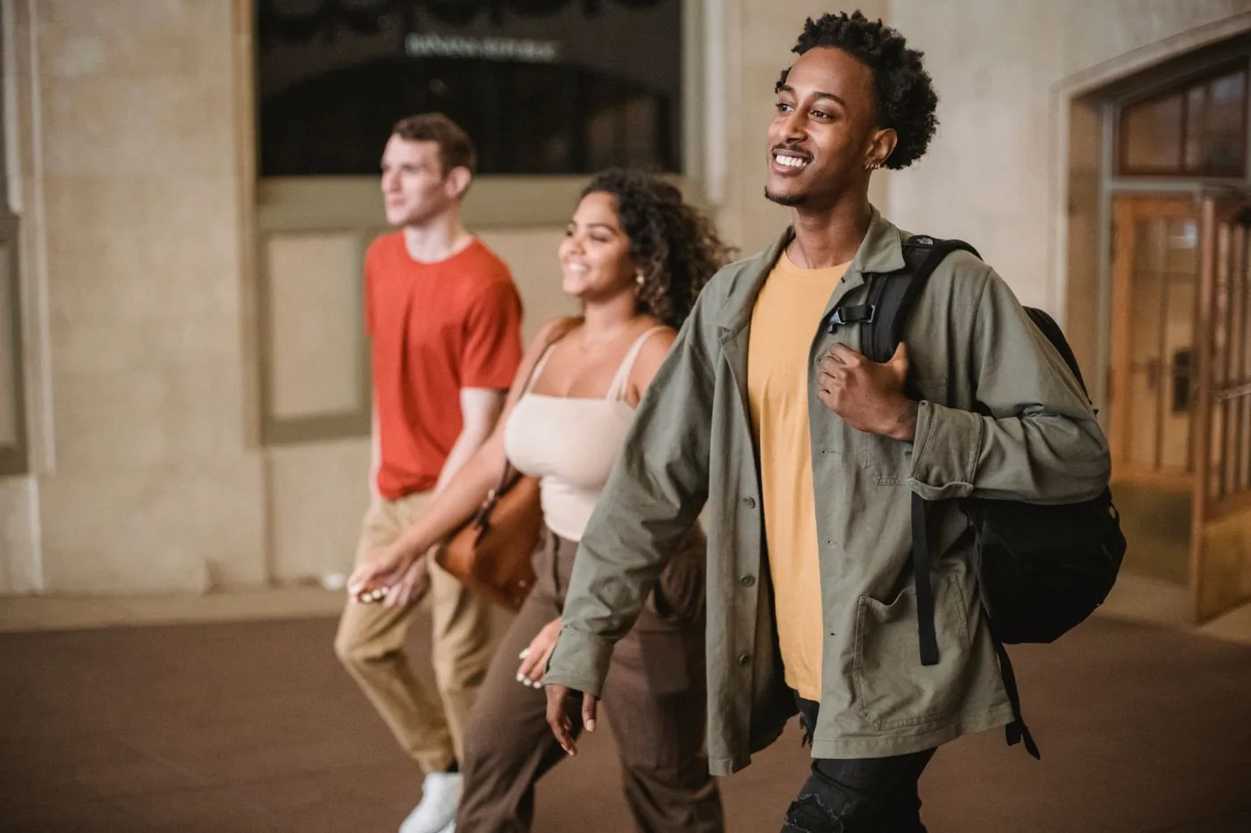 Students walking through the institute corridor