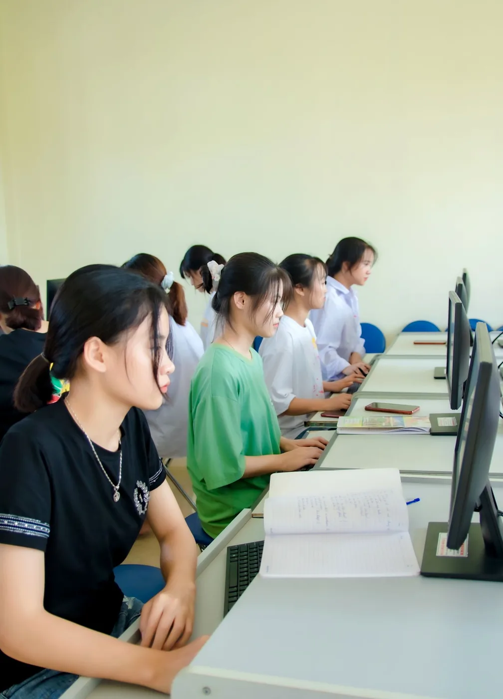 Students at their computers during a training session